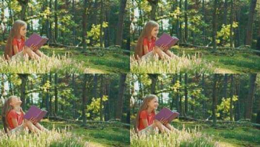 坐在森林里读书的小女孩高清在线视频素材下载