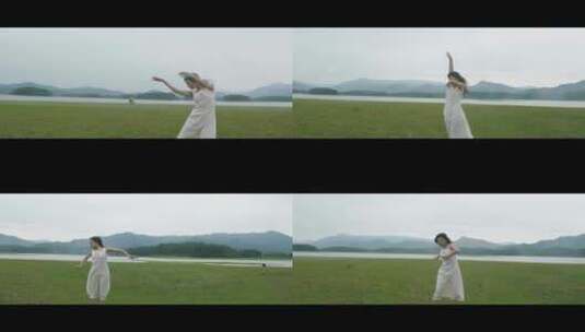 白色连衣裙女子在草原上跳舞高清在线视频素材下载