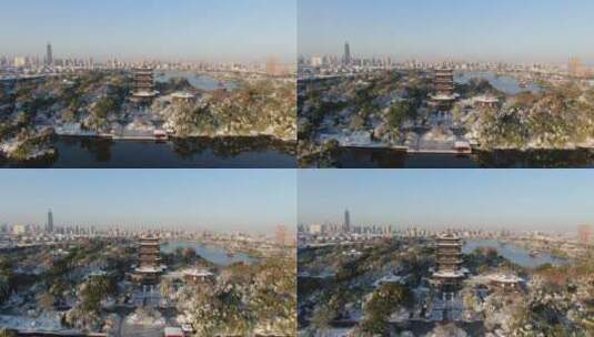 航拍山东济南大明湖5A景区冬天雪景高清在线视频素材下载