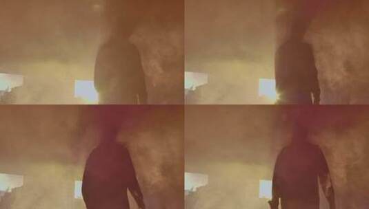 日落时的剪影和烟雾高清在线视频素材下载