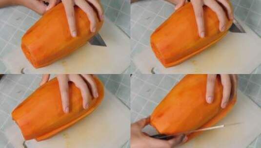 无法辨认的女性手刀切割芳香的木瓜果肉高清在线视频素材下载