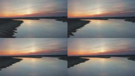 唯美黄昏日落平静的湖面候鸟飞过高清在线视频素材下载