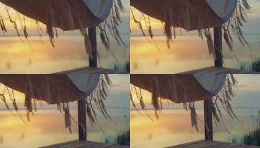湖边的吊床与日落高清在线视频素材下载