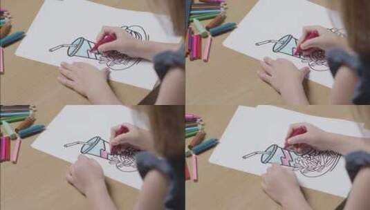 女孩在纸上画汉堡薯条可乐高清在线视频素材下载