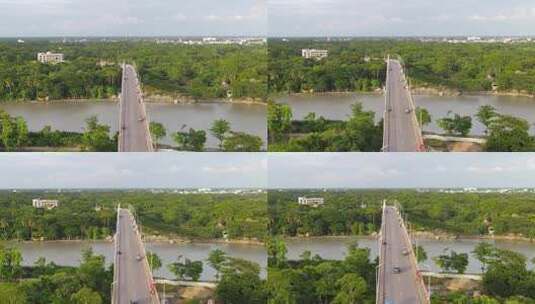 俯瞰驶过车辆的跨河大桥高清在线视频素材下载
