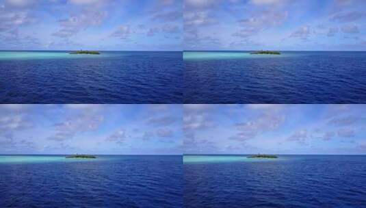 航拍远处海面上的小岛高清在线视频素材下载