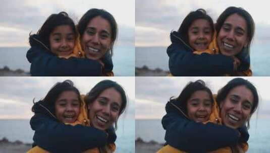 海边背着女孩的母亲高清在线视频素材下载