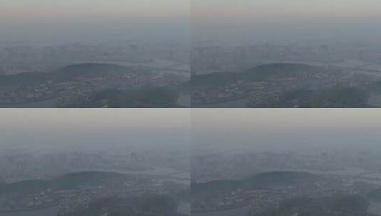 航拍武汉东湖公园清晨大雾城市远景高清在线视频素材下载