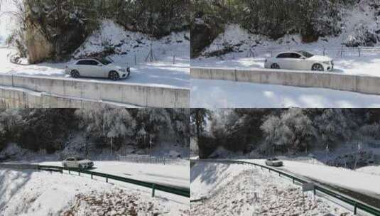 奔驰小轿车在雪地公路行驶旅行航拍雪景雾凇高清在线视频素材下载