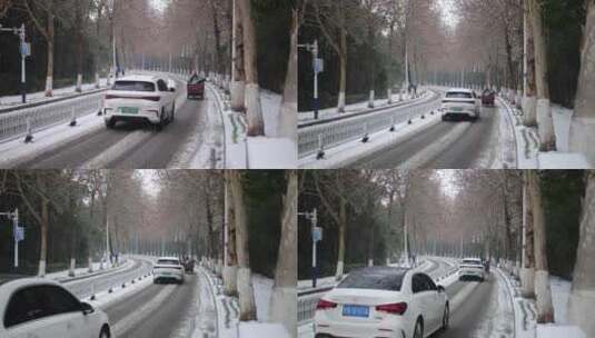 雪天行驶在城市道路的车高清在线视频素材下载