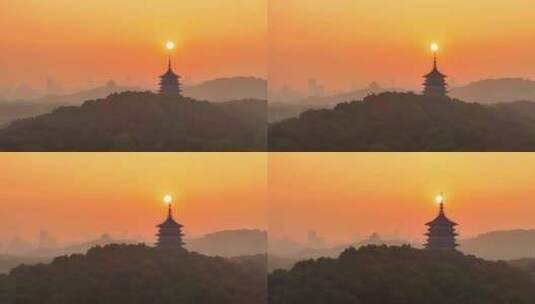 航拍清晨日出杭州西湖风景区雷峰塔建筑同框高清在线视频素材下载