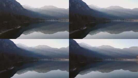 雪山脚下的湖面景观高清在线视频素材下载