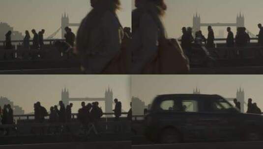 行人穿过伦敦桥的剪影高清在线视频素材下载
