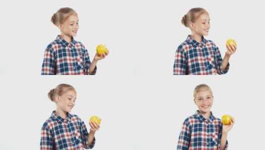 女孩手里拿着黄色菜椒并对着镜头点赞高清在线视频素材下载