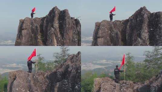 山顶人员手持国旗眺望远方高清在线视频素材下载