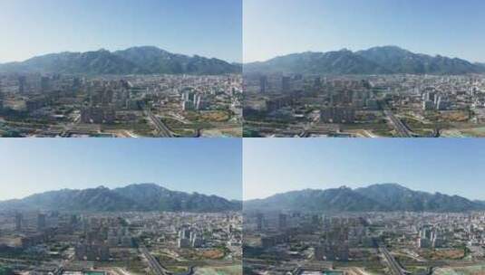 航拍山东泰安城市全貌城市建筑高清在线视频素材下载