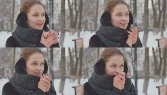 女子在雪地里搓手取暖高清在线视频素材下载