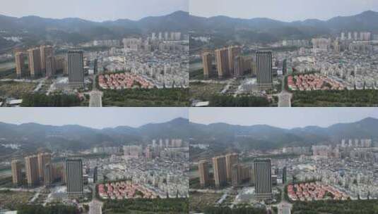 城市航拍大景建筑群山峰高清在线视频素材下载