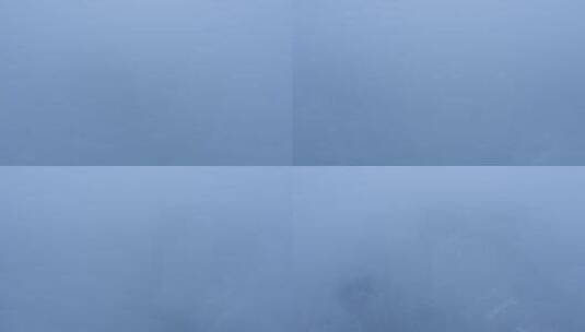 雨雾缭绕广州城市天空航拍高清在线视频素材下载