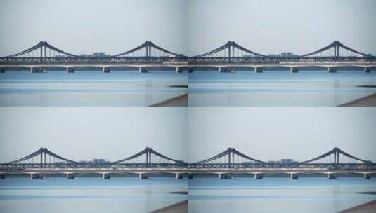 高铁驶过杭州钱塘江上钱江二桥航拍高清在线视频素材下载