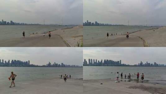 【4K】武汉武昌江滩居民玩水日常生活高清在线视频素材下载