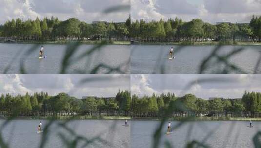 4K人在湖里划皮划艇高清在线视频素材下载