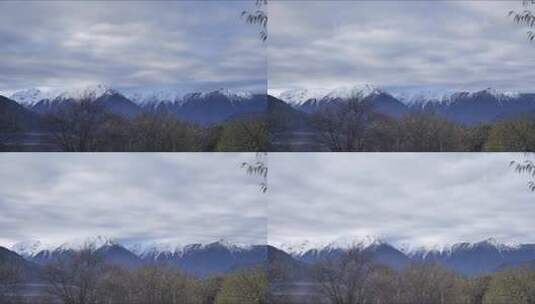 西藏派墨公路雪山山峦道路航拍高清在线视频素材下载