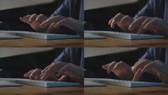 特写男性双手在键盘上打字高清在线视频素材下载