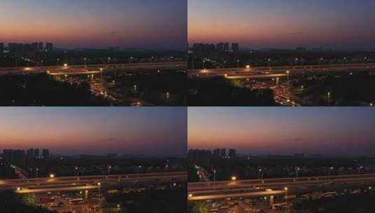 航拍夕阳下的城市道路高清在线视频素材下载