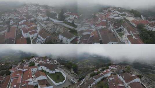 雾气在马沃城堡附近的村庄上空流动，使它看起来被诅咒和闹鬼。高清在线视频素材下载