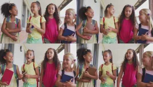 快乐的多样化女孩在学校走廊散步和交谈的视频高清在线视频素材下载