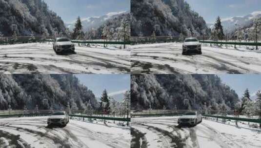 奔驰小轿车在雪地公路上旅行航拍雪景雾凇高清在线视频素材下载