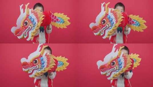 龙年亚洲男孩手拿龙装饰物舞龙高清在线视频素材下载