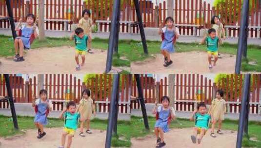 小朋友在公园玩荡秋千高清在线视频素材下载