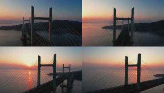 夕阳下的跨海大桥航拍高清在线视频素材下载