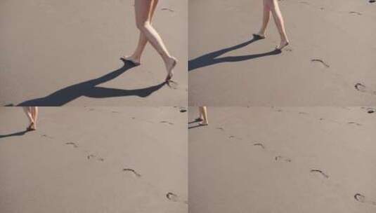 女生走过沙滩，流下脚印高清在线视频素材下载