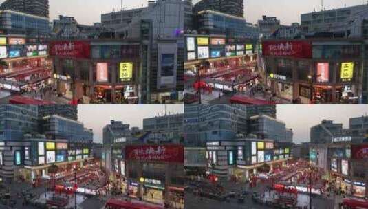 航拍广汉百伦百货广场商业中心夜市高清在线视频素材下载