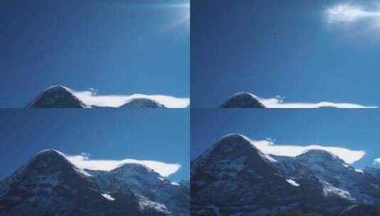 雪山上的蓝天白云高清在线视频素材下载