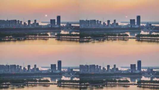 江西九江市黄昏城市中焦景观日落航拍延时高清在线视频素材下载