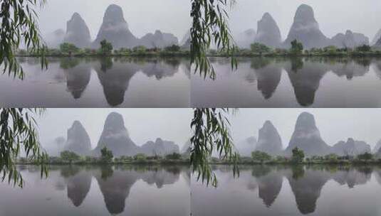 雨天湖景倒映绿树青山的宁静画面高清在线视频素材下载