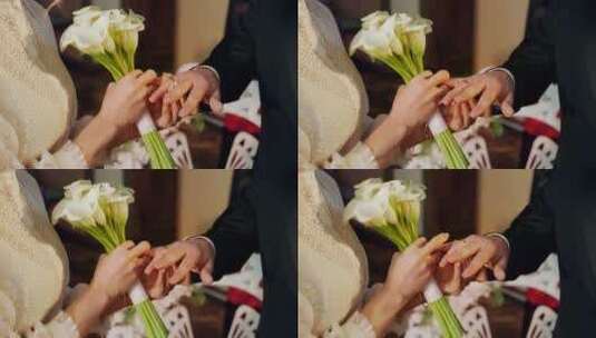 新娘把结婚戒指戴在新郎手上高清在线视频素材下载