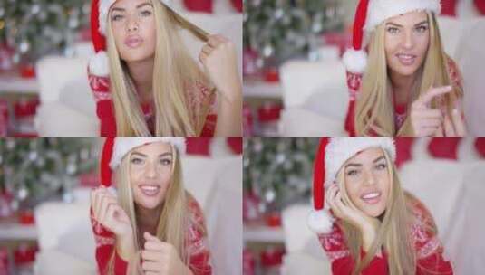 戴着圣诞老人帽子的漂亮女孩高清在线视频素材下载