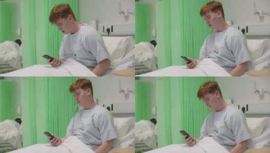 病人坐在病床上看手机高清在线视频素材下载