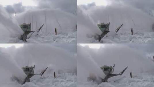 扫雪机清理积雪的道路高清在线视频素材下载
