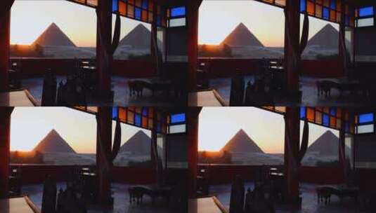 透过咖啡馆的窗户可以看到埃及的金字塔高清在线视频素材下载