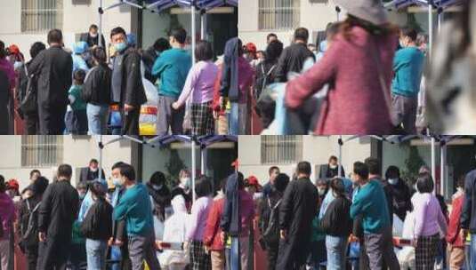 亚洲中国人城市居民排队做核酸做检查高清在线视频素材下载