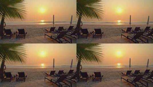 夕阳海边沙滩躺椅椰子树高清在线视频素材下载