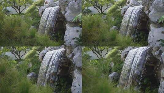 传统中式园林内的假山瀑布高清在线视频素材下载
