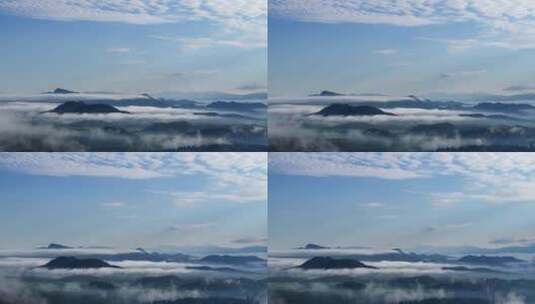 清晨云雾缭绕的火山大地绿色农田高清在线视频素材下载