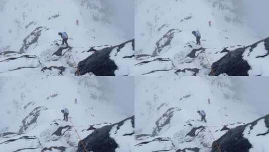 登山者攀登四川甘孜贡嘎山乡乌库楚雪山高清在线视频素材下载